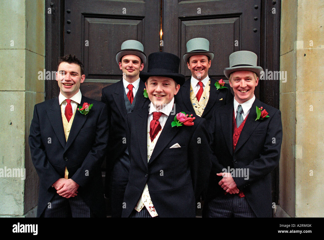 Groom with his Best Man and Groomsmen wait for the bride at the church