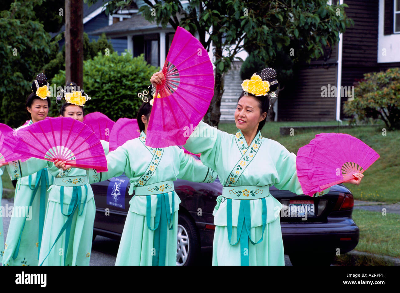 Falun Gong aka Falun Dafa Dancers in Traditional Costume dancing in