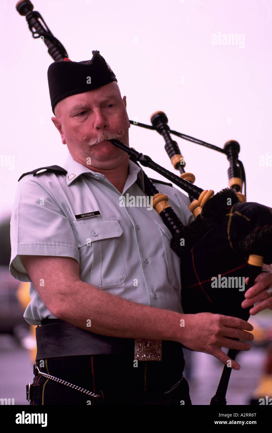 A Senior Man playing the Bagpipes Stock Photo