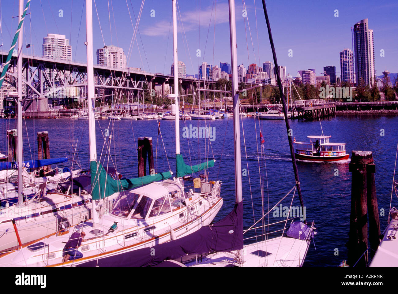 Pleasure Boats docked in False Creek at Granville Island in City of Vancouver British Columbia Canada Stock Photo