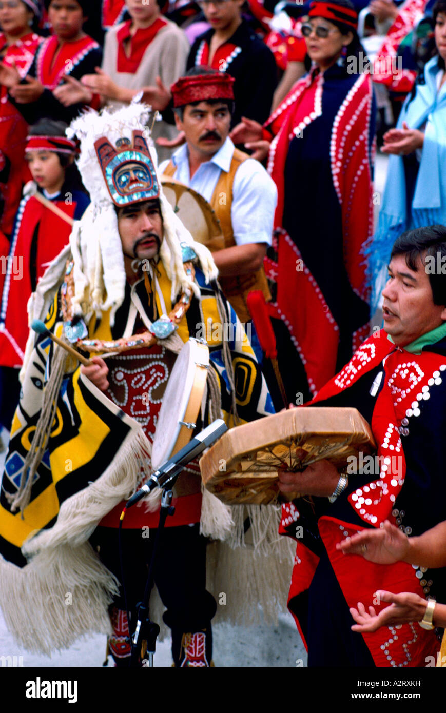 Native American Indians in Traditional Ceremonial Regalia celebrating at a Pow Wow in Bella Bella British Columbia Canada Stock Photo