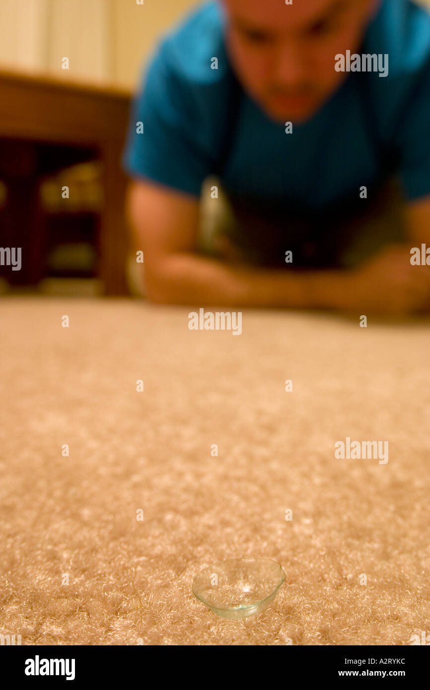 contact lens lost on carpet Stock Photo Alamy
