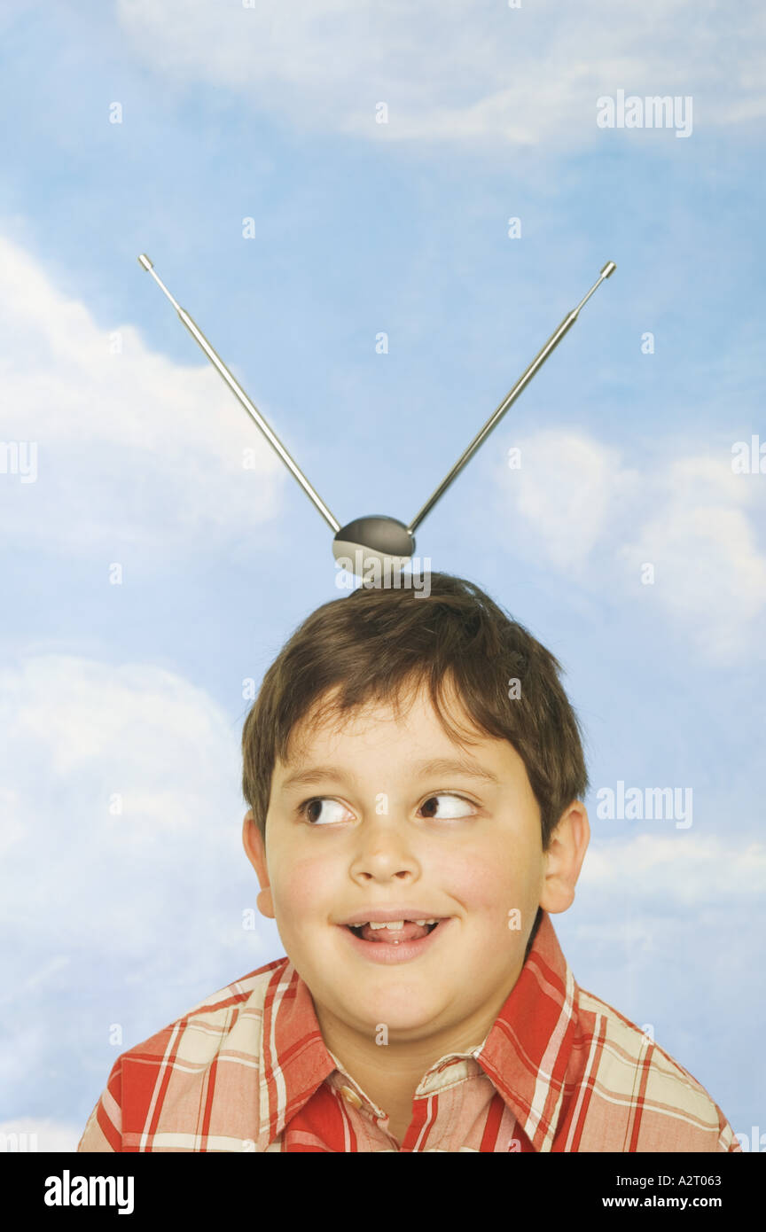 Young boy with antennae coming out of his head Stock Photo