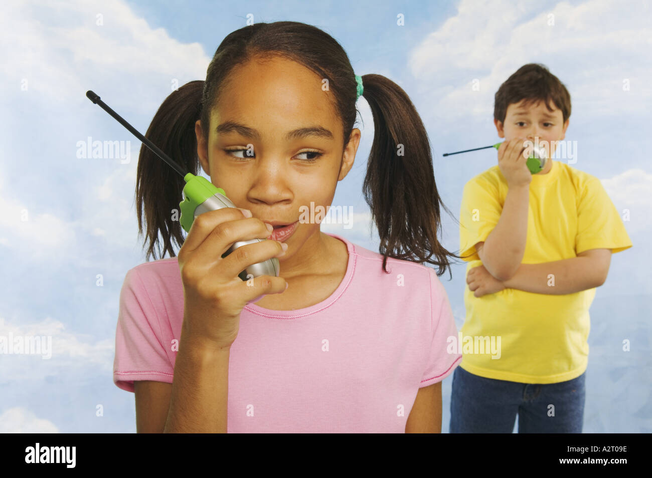 Two kids talking on walkie talkies Stock Photo Alamy