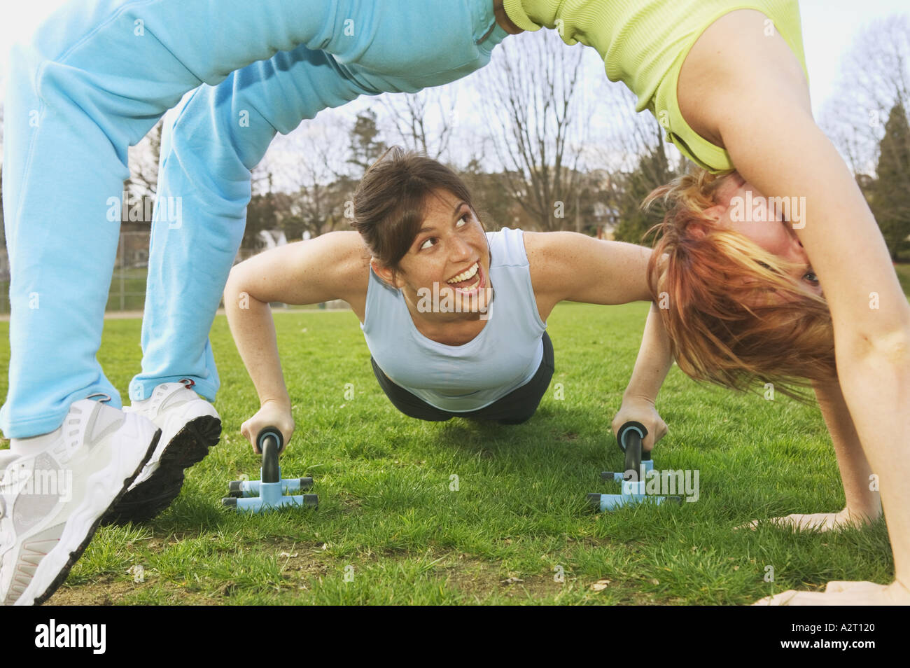 Two young women working out together Stock Photo