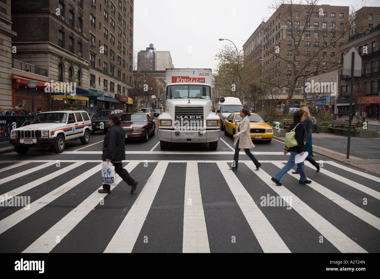 Pedestrians crossing Broadway Upper West Side New York City USA Stock Photo