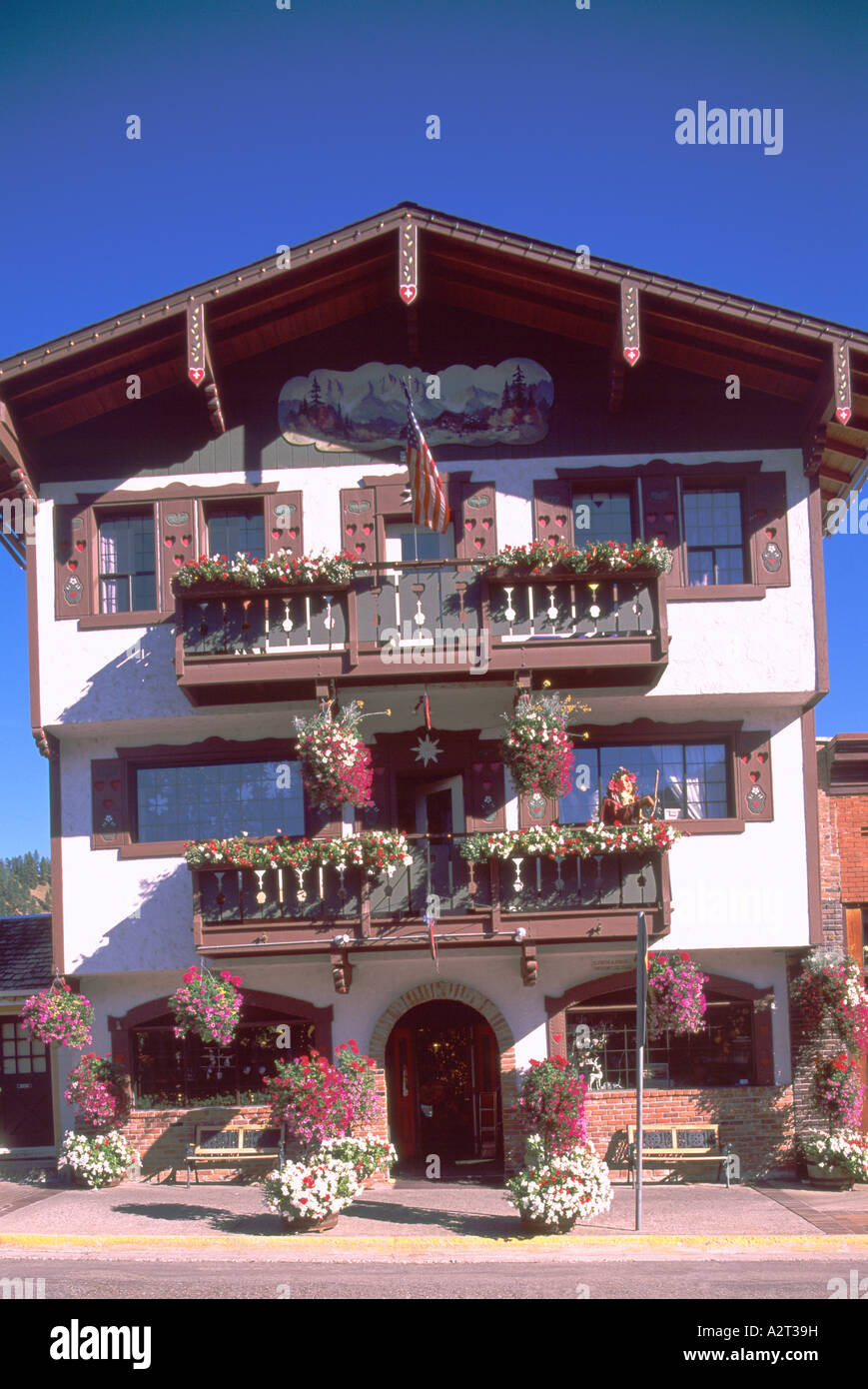 Leavenworth, WA, Washington State, USA - Bavarian Village, Hotel, Building Exterior Facade Flowers in Flower Boxes and Planters Stock Photo