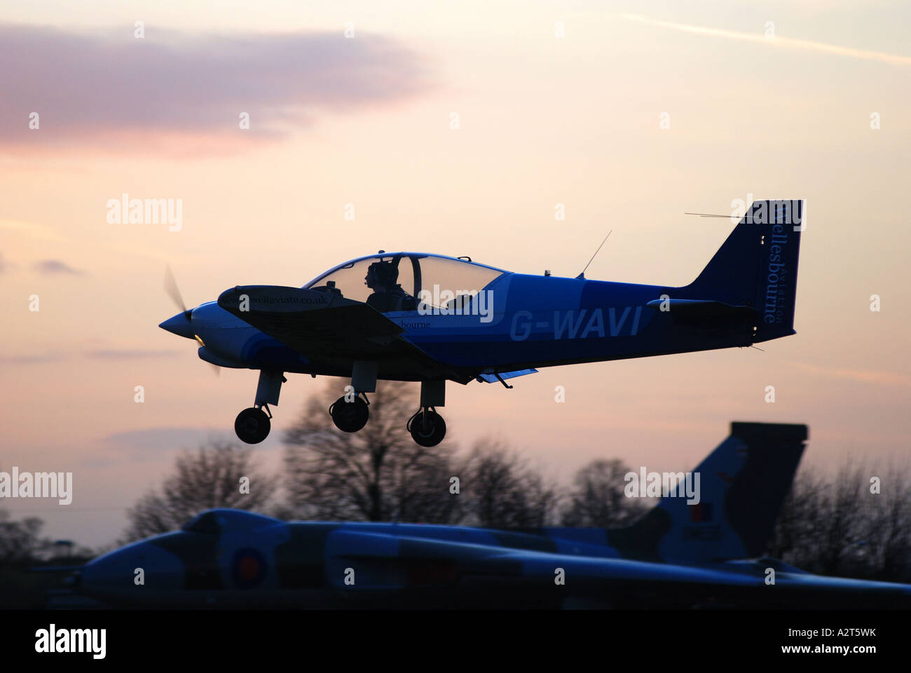 Robin R200 Robin HR 200 aircraft landing at Wellesbourne Airfield with Vulcan B2 ...