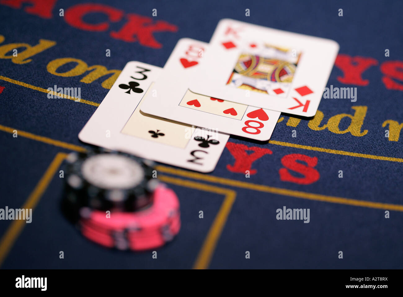 Close up of a casino chip playing cards four aces ace card symbol of win luck success triumph winning winner poker black jack Stock Photo