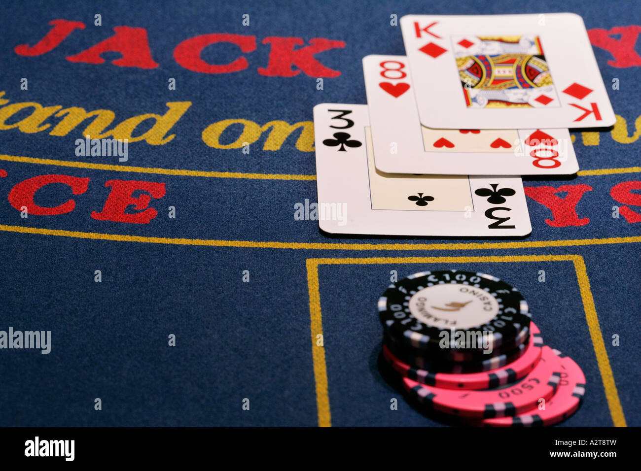 Close up of a casino chip playing cards four aces ace card symbol of win luck success triumph winning winner poker black jack Stock Photo