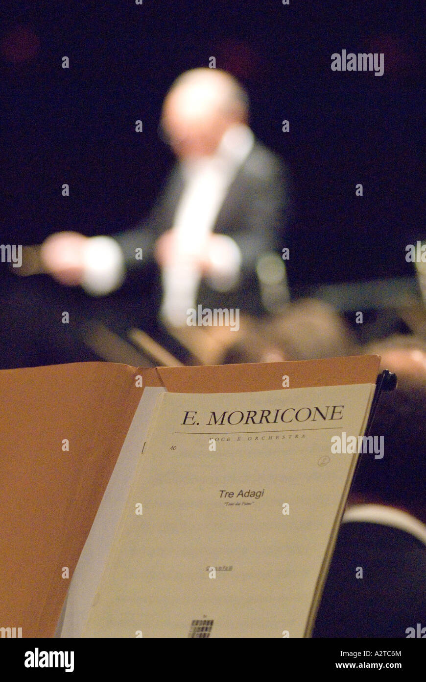 The late Italian film composer Ennio Morricone (10 November 1928-6 July 2020) in concert Hammersmith Apollo, London, UK, December 2006. Stock Photo