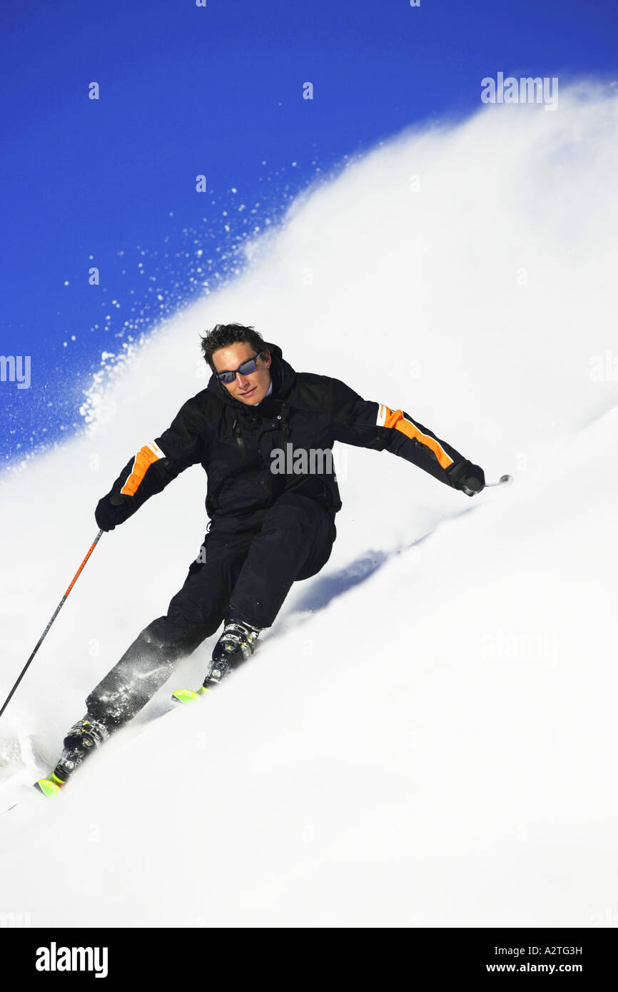skier racing down, Austria, Alps Stock Photo - Alamy