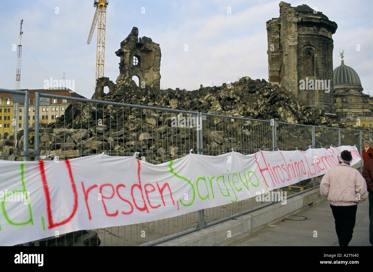 anti war banner on wire fence dresden germany 1993 Stock Photo