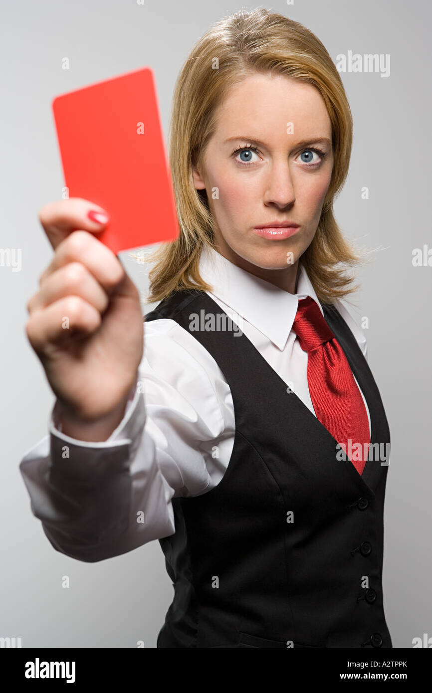Woman holding red card Stock Photo - Alamy