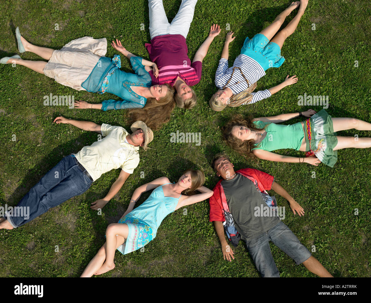 Frienda asleep in a circle Stock Photo