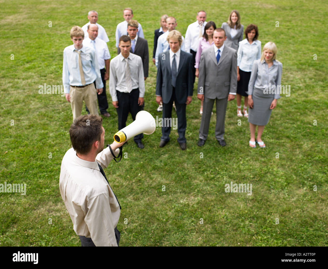 Businessman talking to colleagues Stock Photo