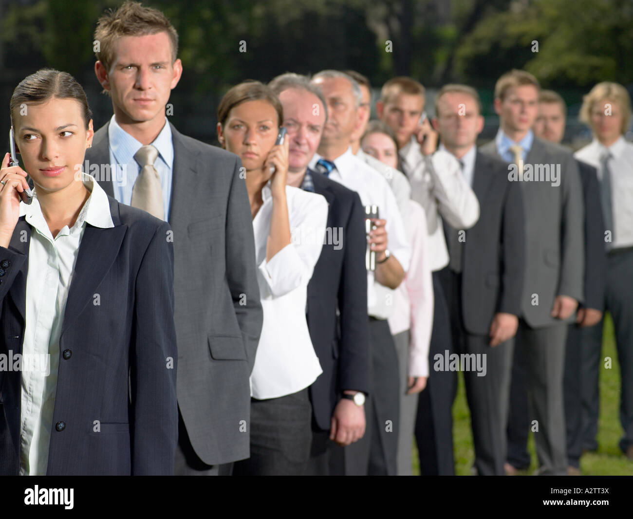 Businesspeople queuing Stock Photo