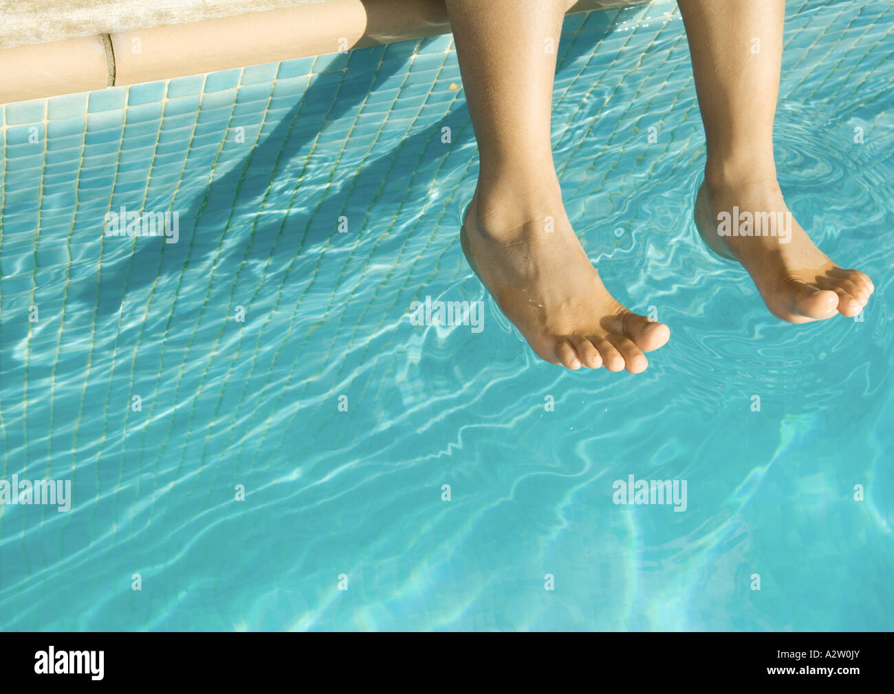 Feet Dangling Over Swimming Pool Stock Photo 10596770 Alamy Feet Dangling Over Swimming Pool Stock Photo 10596770 Alamy