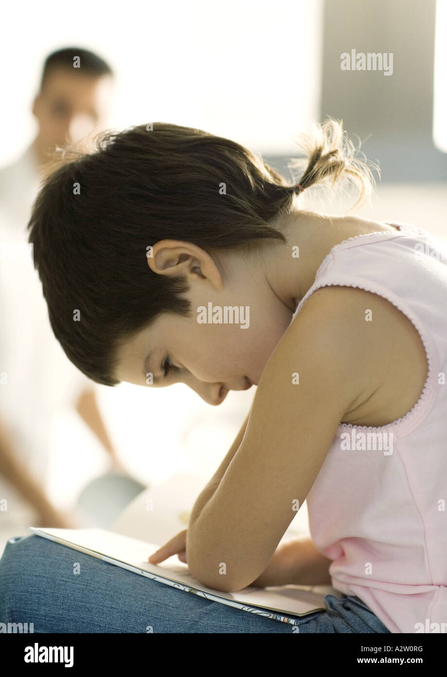 Child reading book Stock Photo Alamy