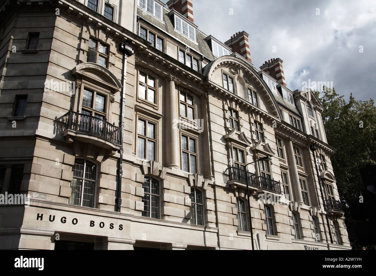 Decorative building with Hugo Boss logo on Sloane Square in Belgravia London  SW1 England Stock Photo - Alamy