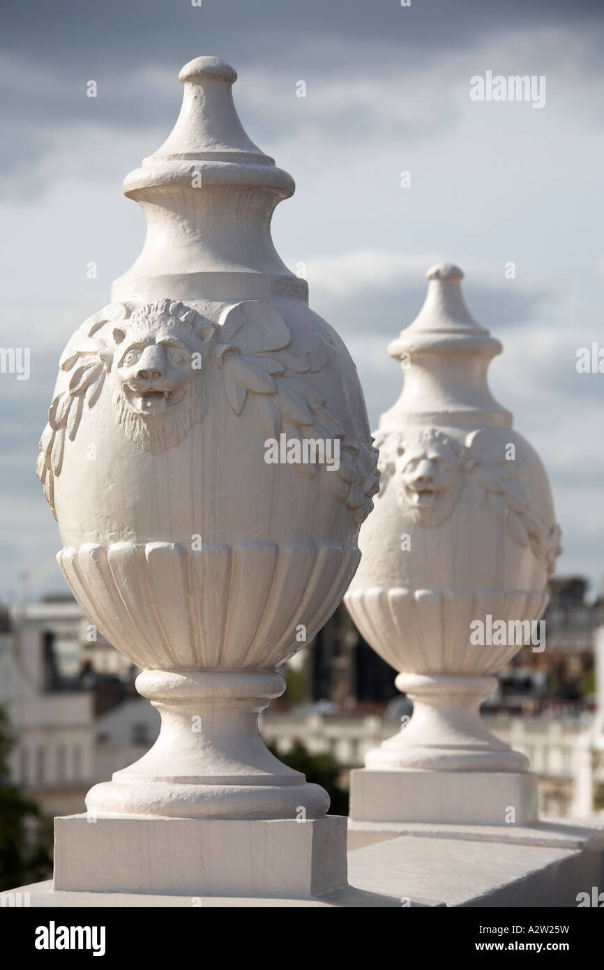 Roof top decorative urn detail on Stucco Victorian terraced building in  Belgrave Square in Belgravia London SW1 England Stock Photo - Alamy