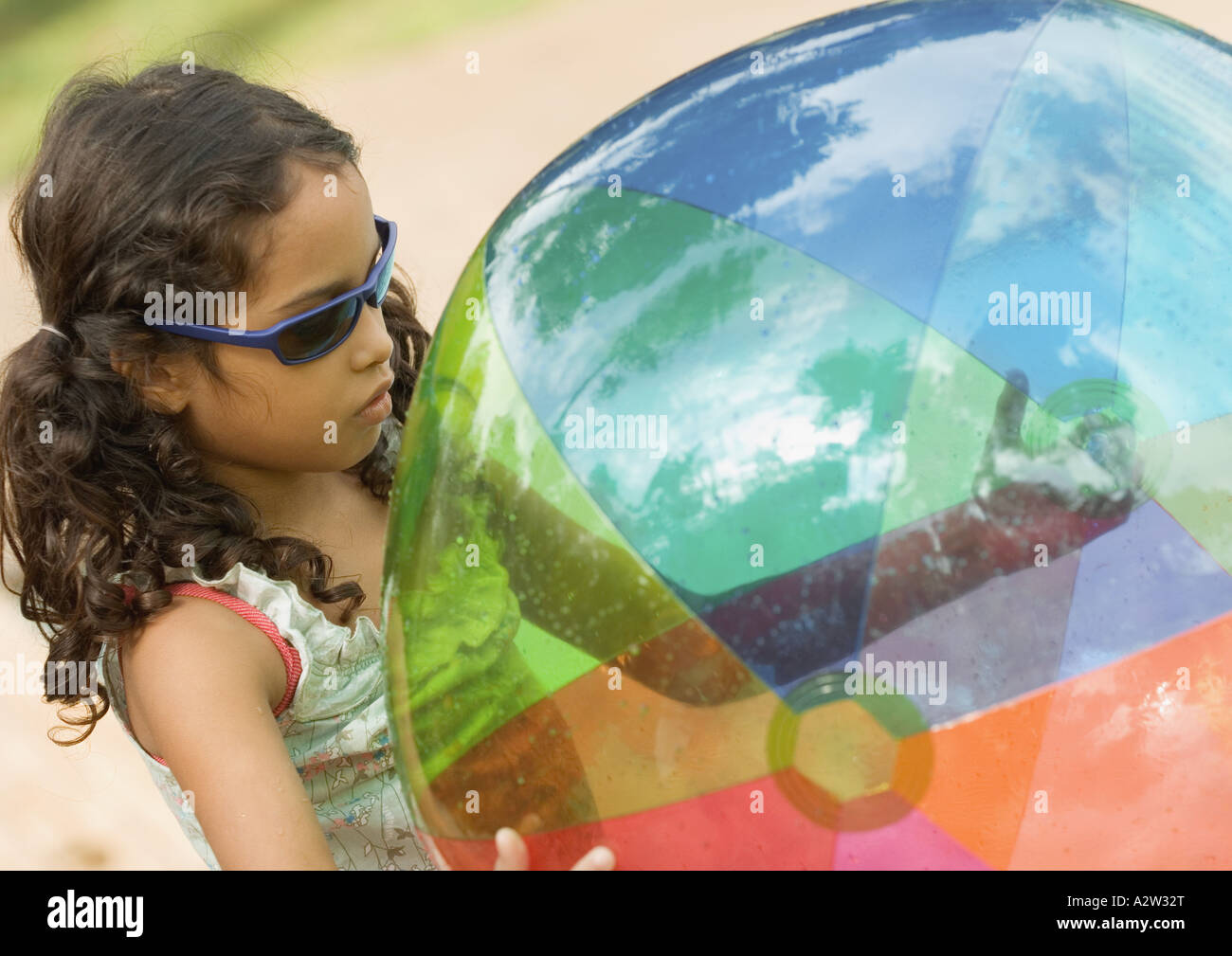 Little Girl Holding Beach Ball High Resolution Stock Photography and Images  - Alamy