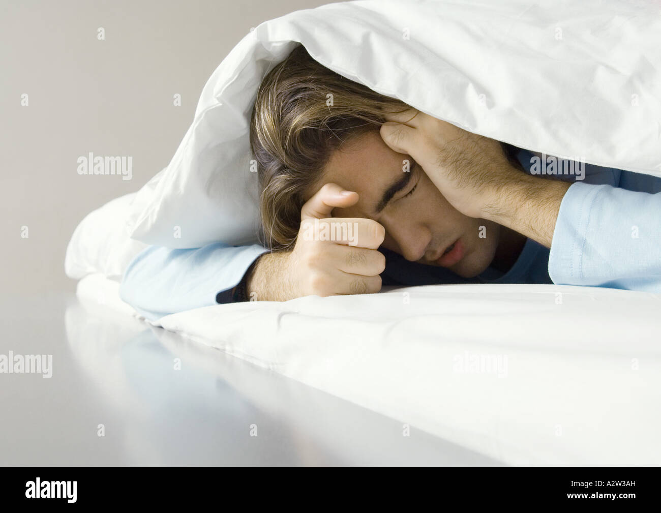 Hiding Under Bed Covers High Resolution Stock Photography and Images