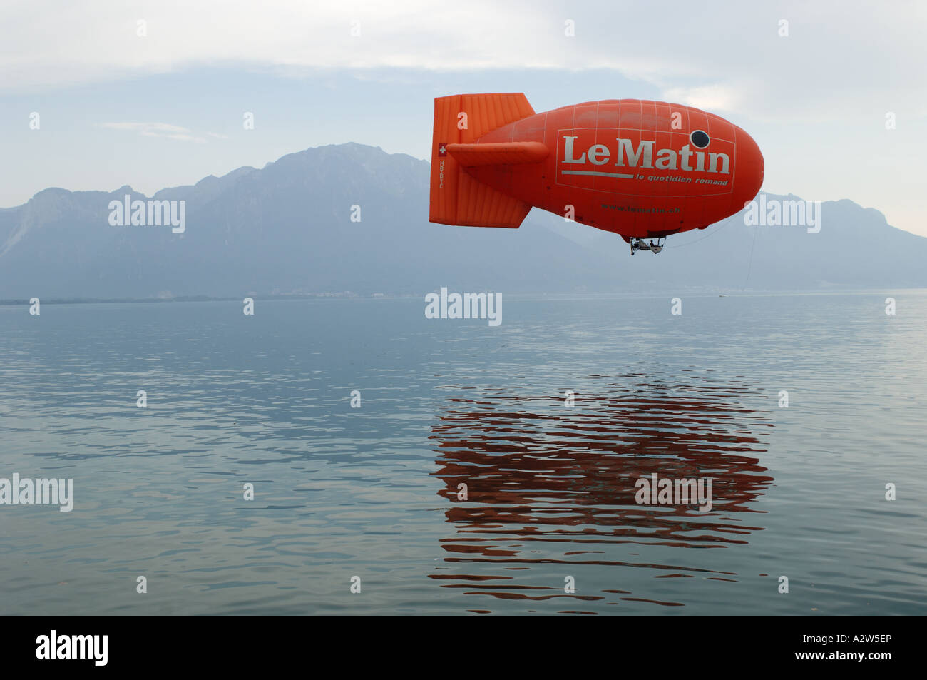 Le Matin airship over Lake Geneva Vevey Switzerland Stock Photo