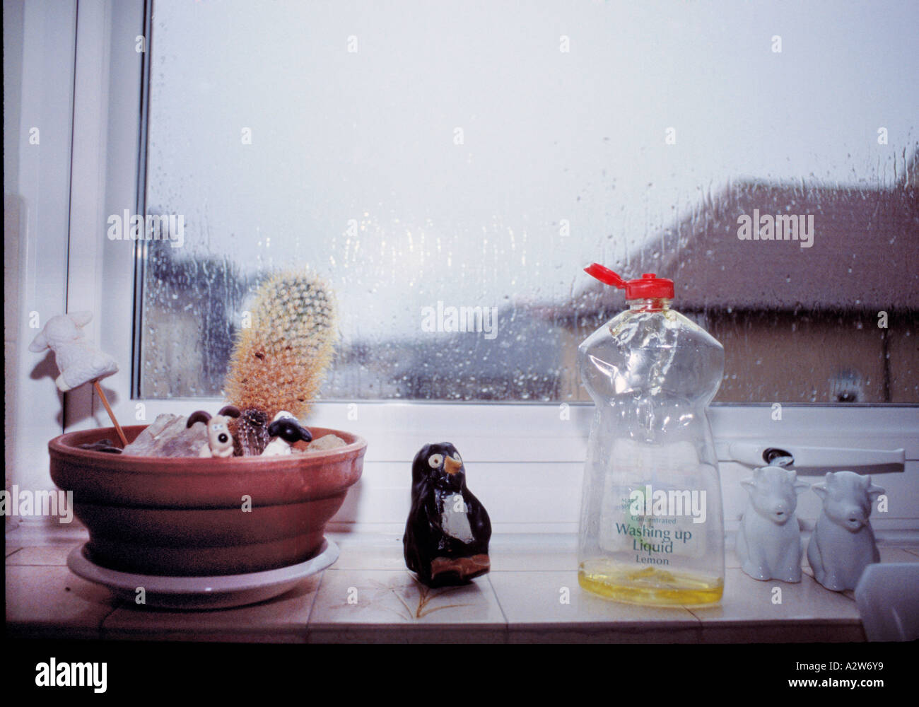 WINDOW SILL RAIN AND ORNAMENTS Stock Photo Alamy