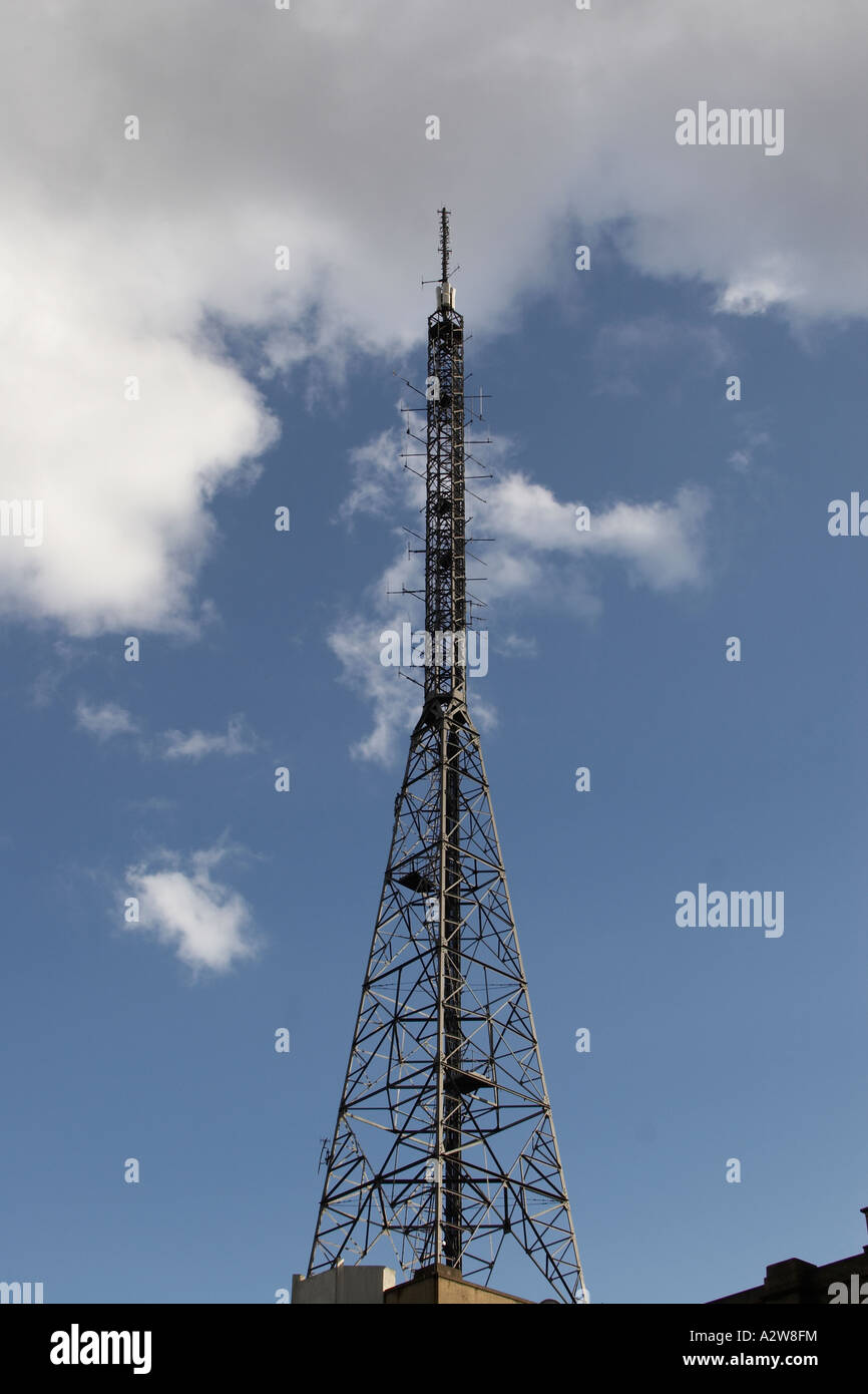 Alexandra Palace BBC TV television transmiter mast against blue sky ...