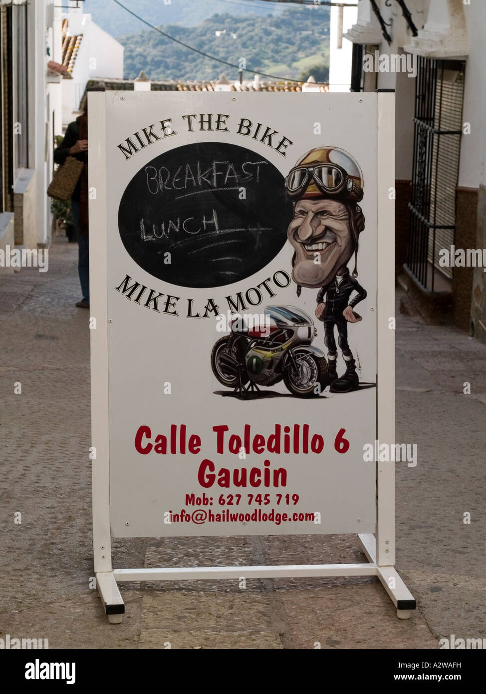 Sign for a café themed on famous motor cycle racer Mike Hailwood in Gaucin Malaga Province Andalusia Spain Stock Photo