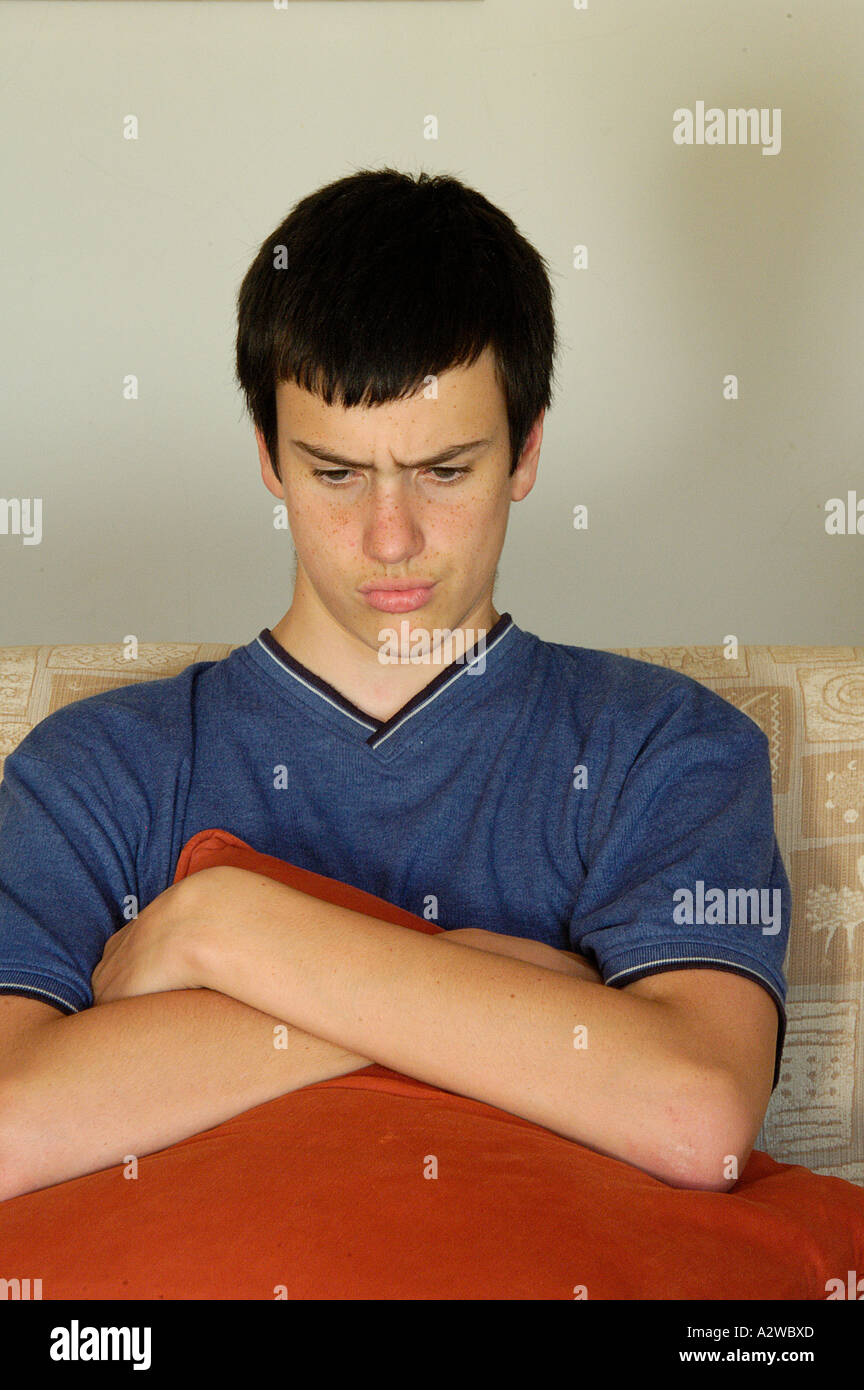 Teenage boy looking very fed up hi-res stock photography and images - Alamy