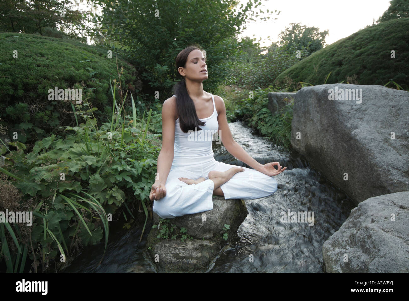 Body and Soul, Meditation, Yoga, woman Wellness leisure balance wellbeing Lotus Padmasana Stock Photo