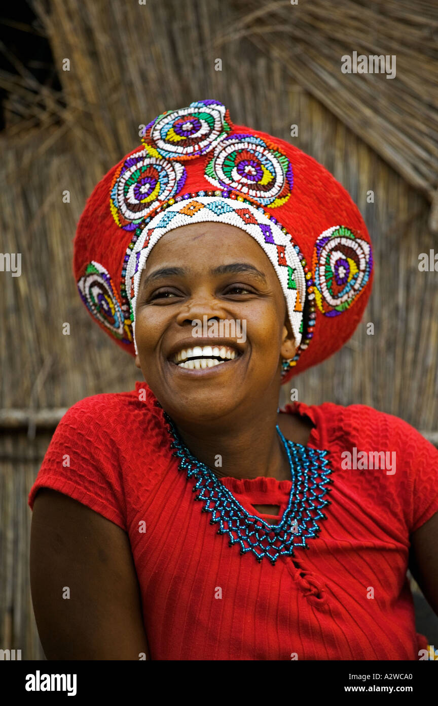 Zulu woman in traditional red headdress of a married woman Model ...