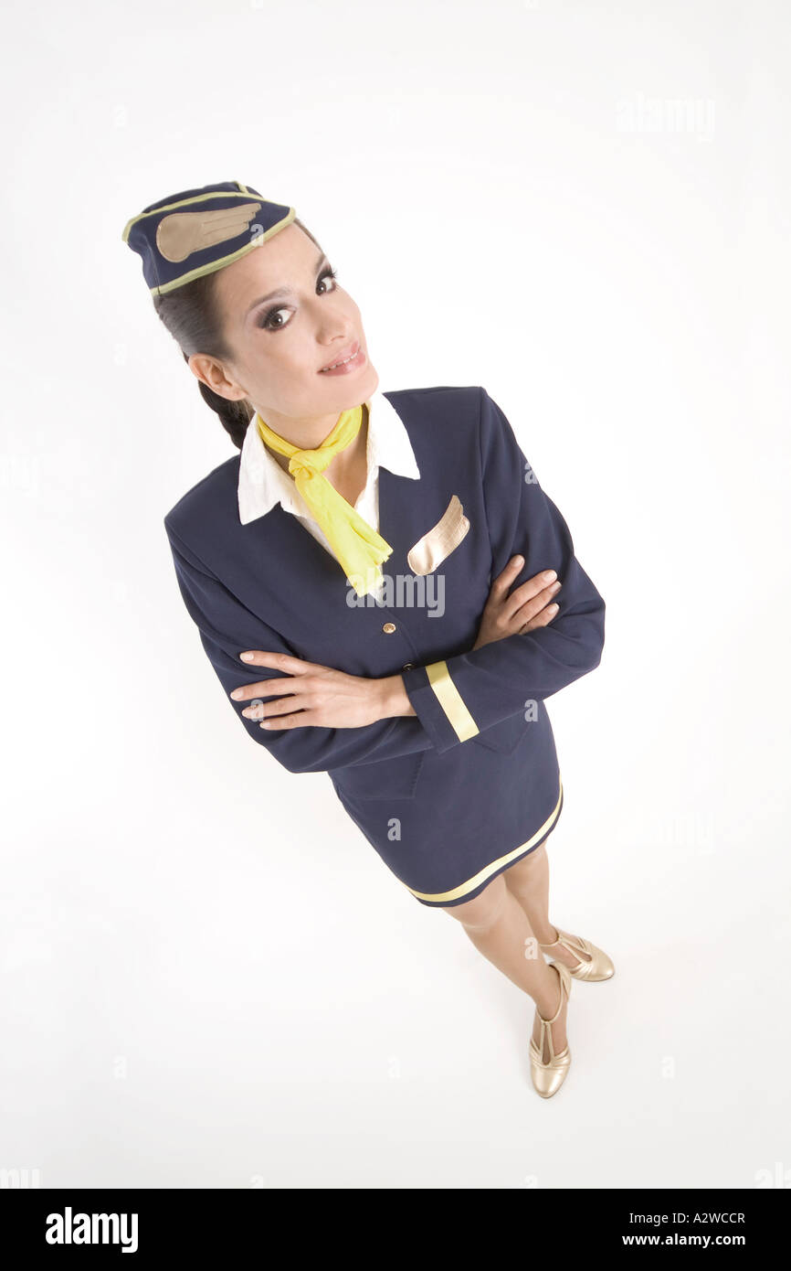 young Stewardess in Retro clothes of the fifties, flight attendant Stock Photo