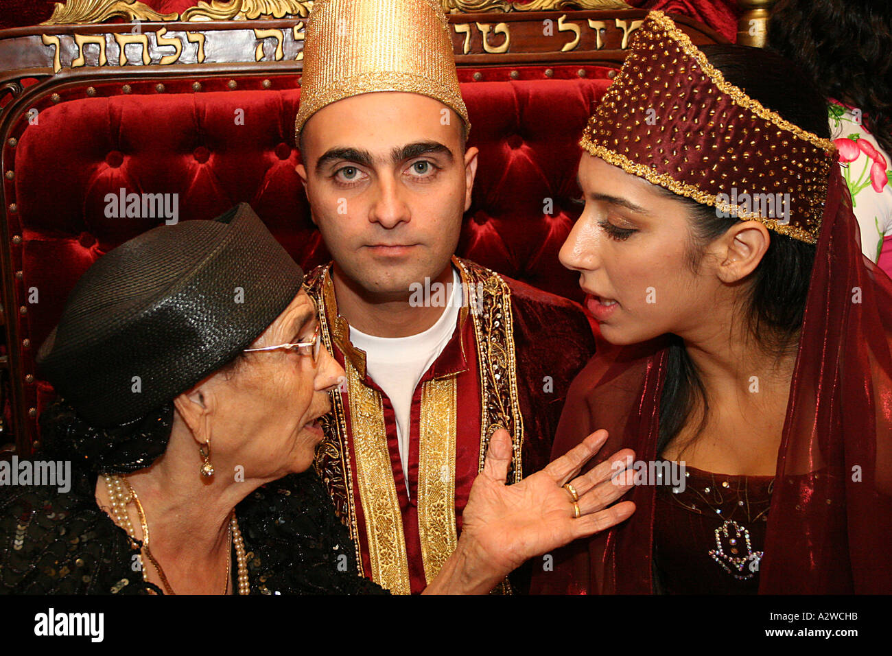 The bride and groom to be at a henna ceremony Stock Photo - Alamy