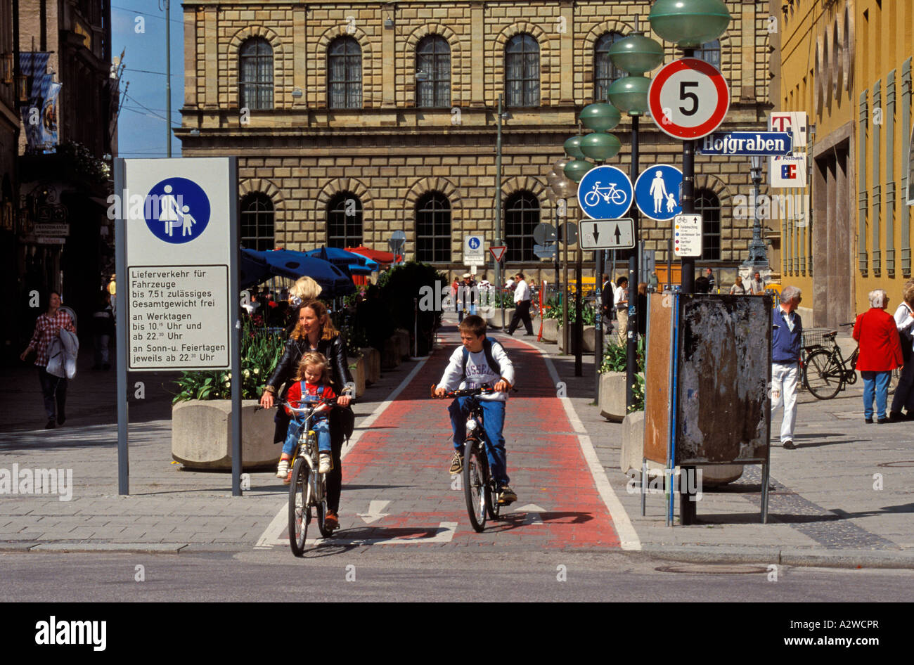 Germany Munich cyclists on a two way cycle path Stock Photo Alamy