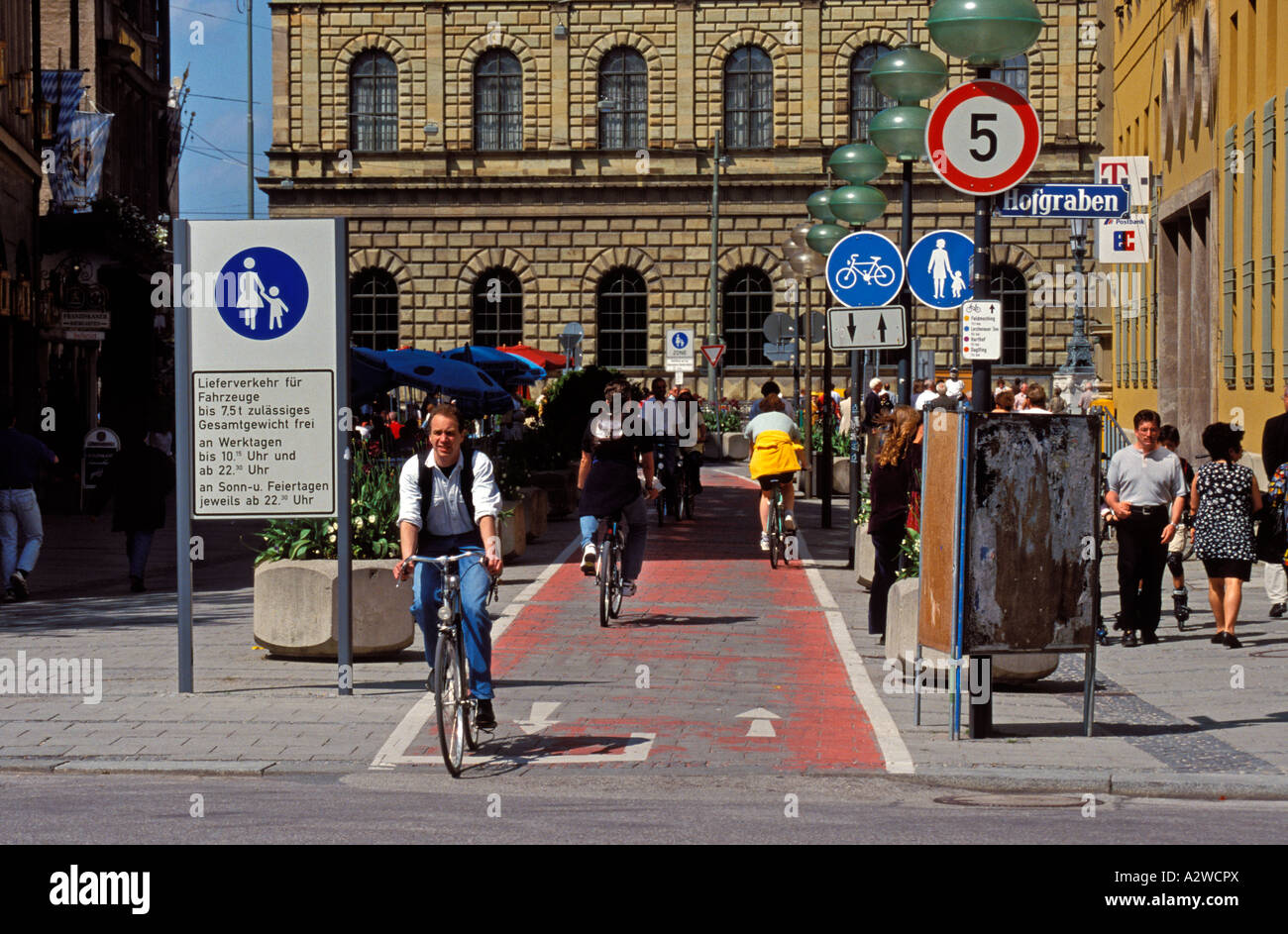 Germany Munich cyclists on a two way cycle path Stock Photo Alamy