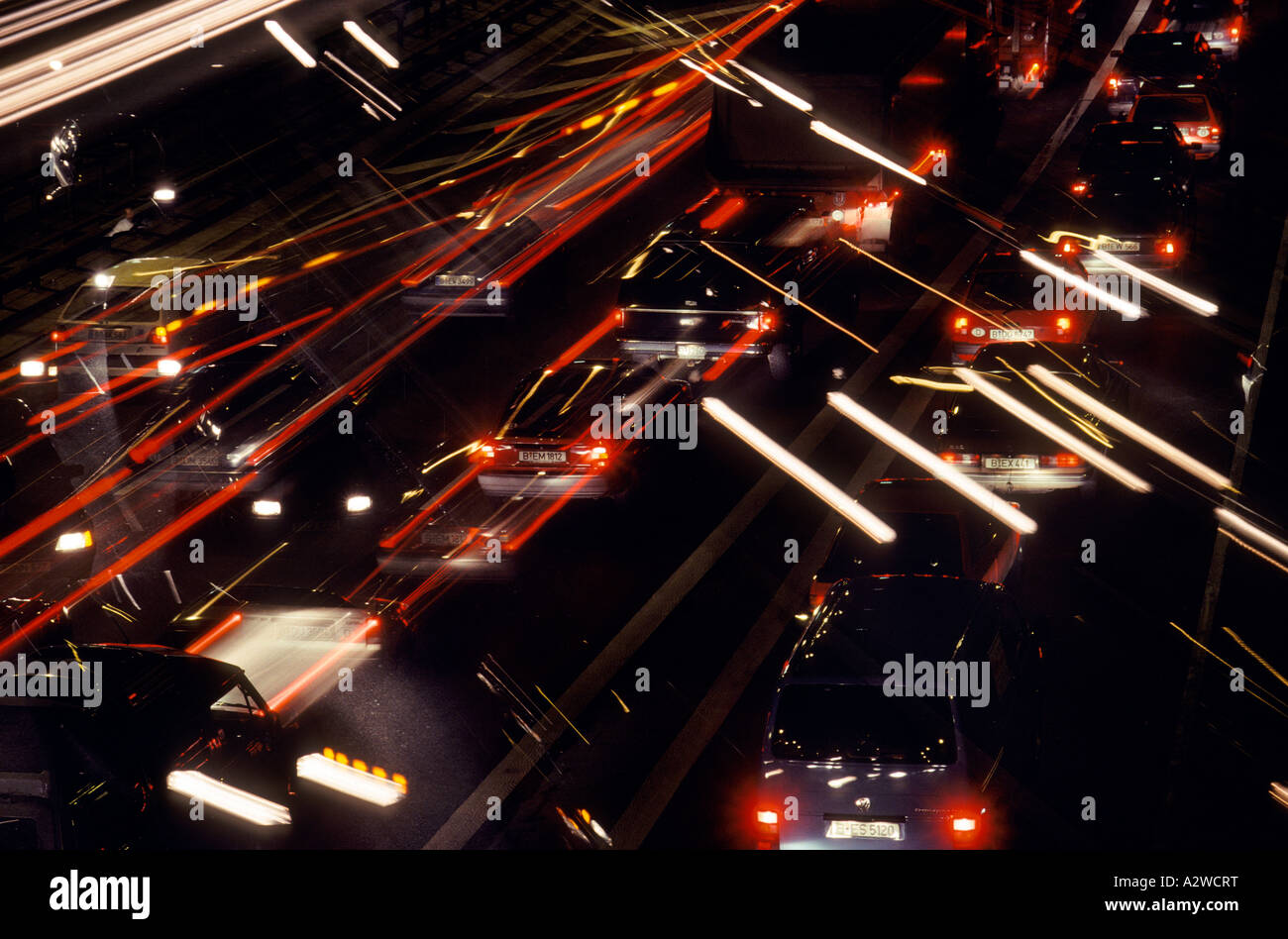 Hectic traffic at night double exposure Stock Photo