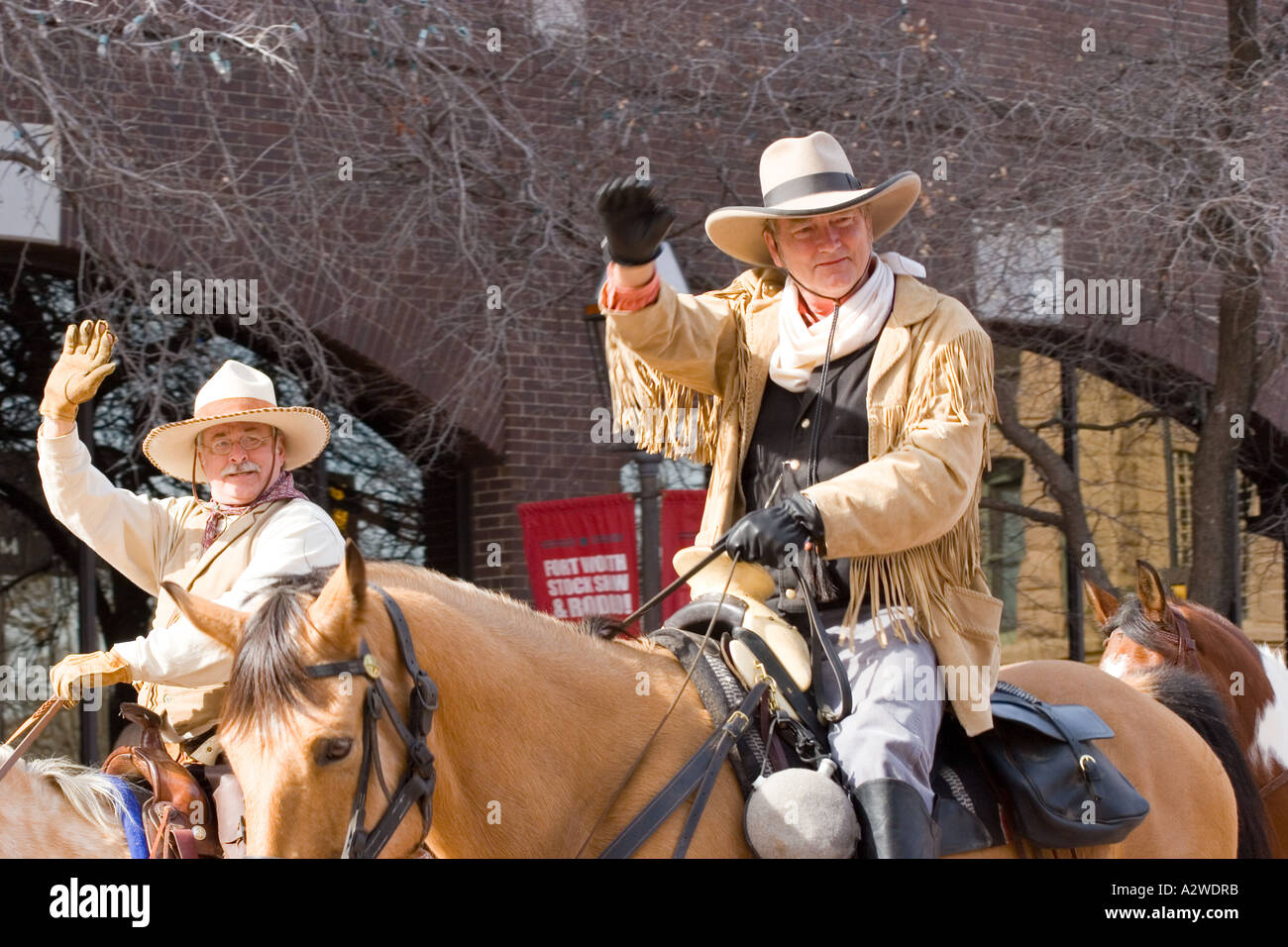 Two Mature Cowboys Ride Horses in Downtown Fort Worth, Texas, Fort