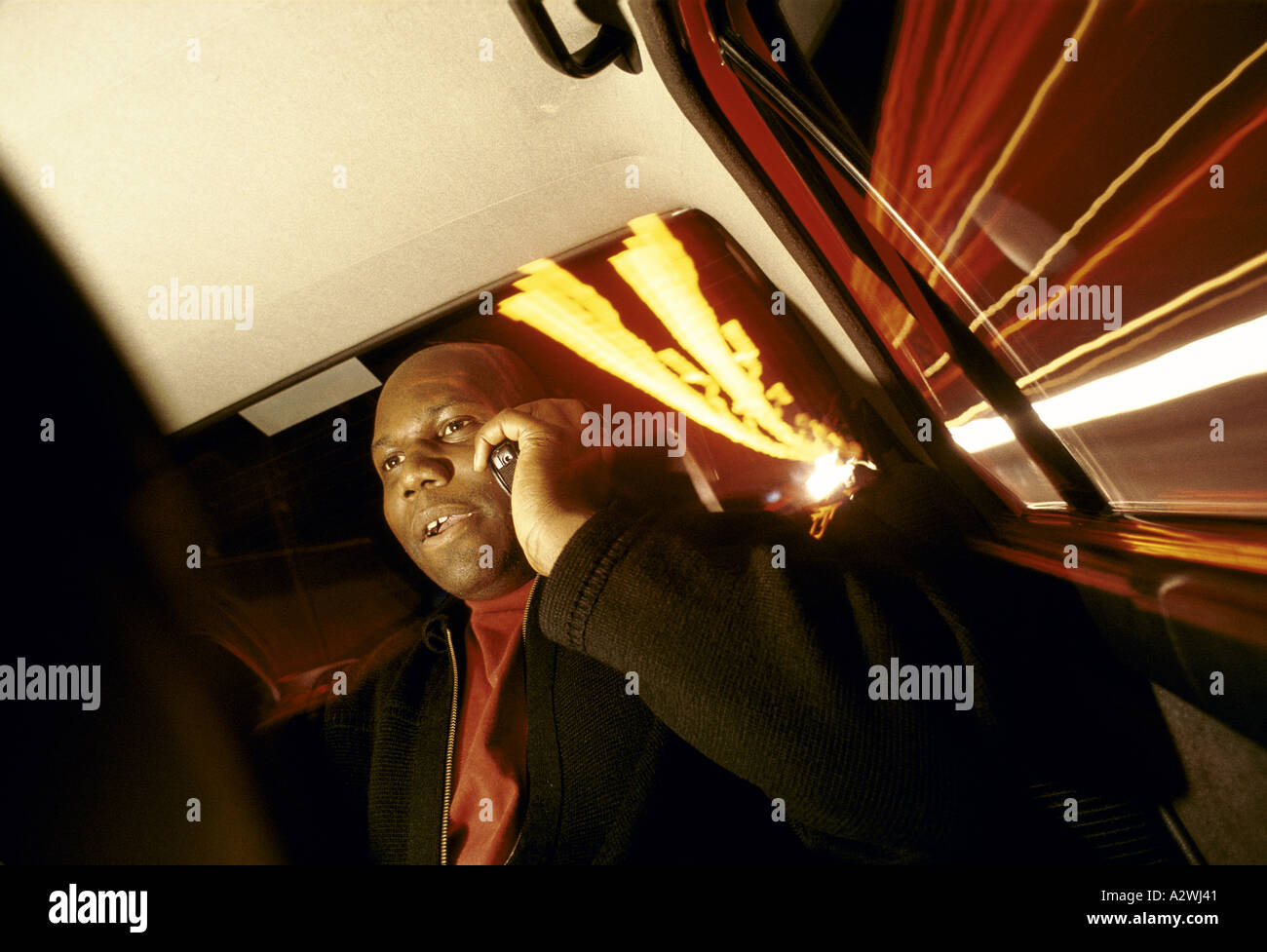 carl cox popular rave dj using mobile phone, Leeds, England. Stock Photo