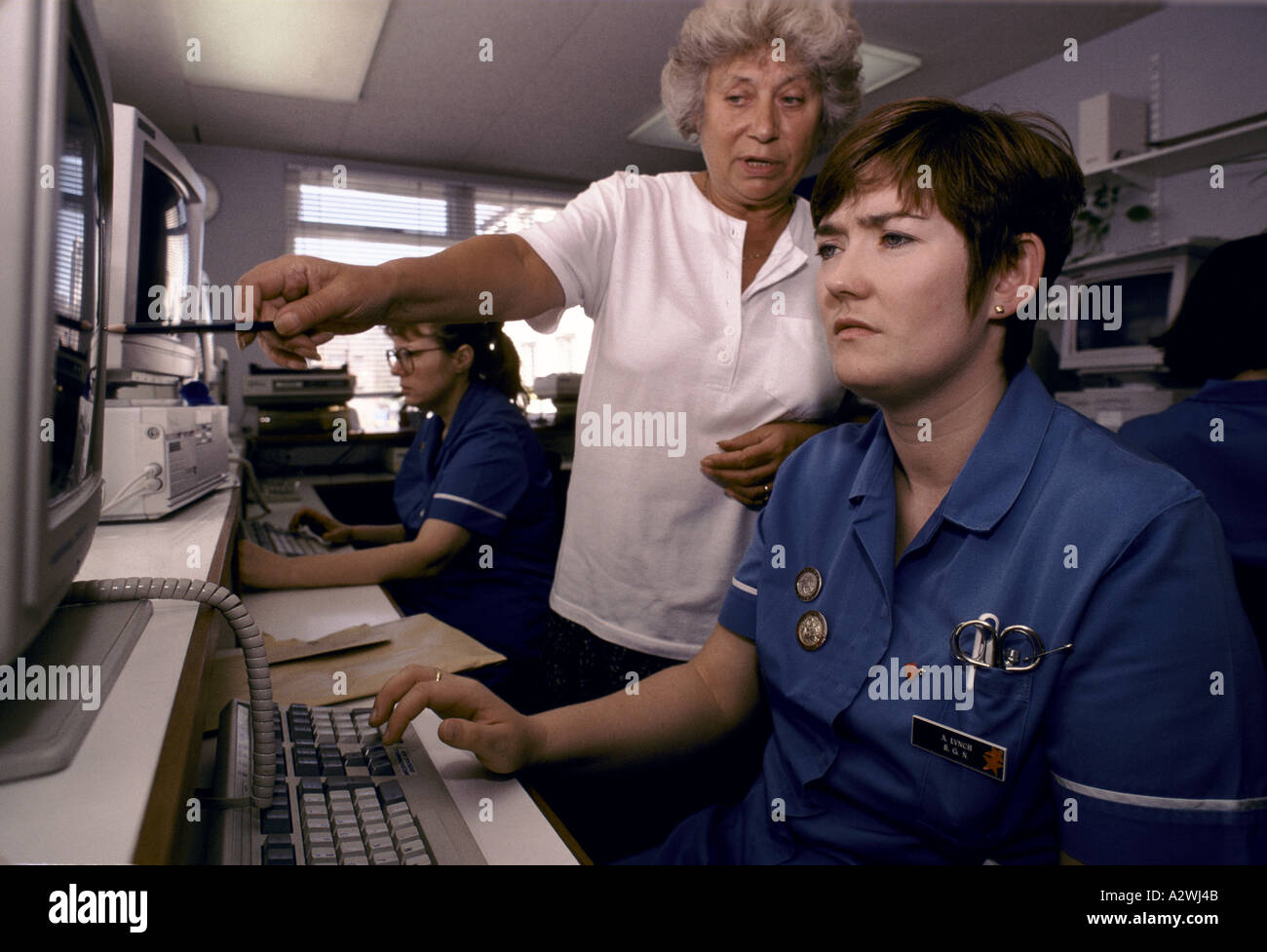 nurses learning to use computer technology at st mary s hospital paddington london Stock Photo