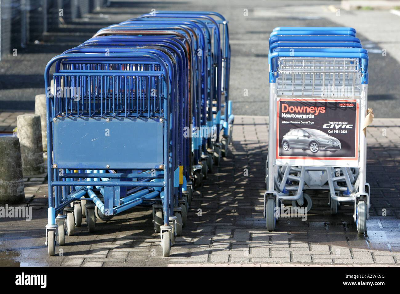 two rows of airport baggage trolleys at Belfast International Airport