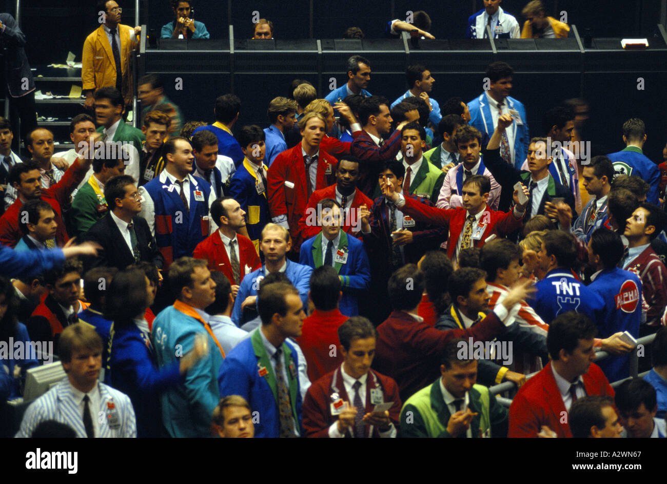 Traders on the Liffe trading floor at the London Stock  Exchange, wearing jackets of different colours. Stock Photo