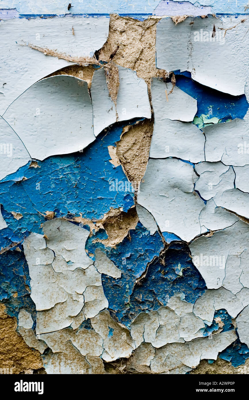 Close-up of cracked paint falling off wall, Peeling Paint Texture Stock Photo