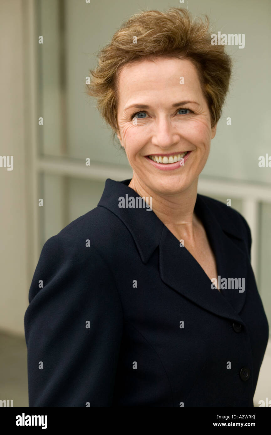 Mature woman smiling, portrait Stock Photo - Alamy