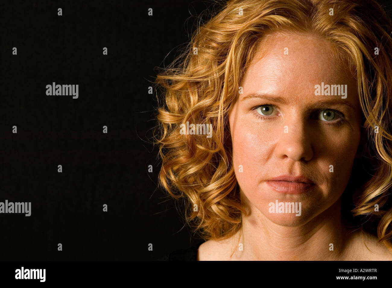 Attractive curly blonde woman hi-res stock photography and images - Alamy