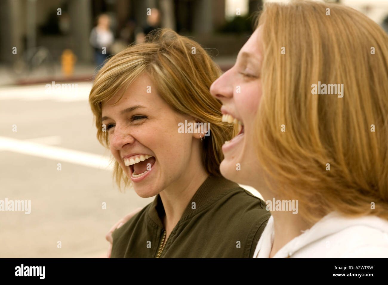 Laughing with a friend woman hi-res stock photography and images - Alamy