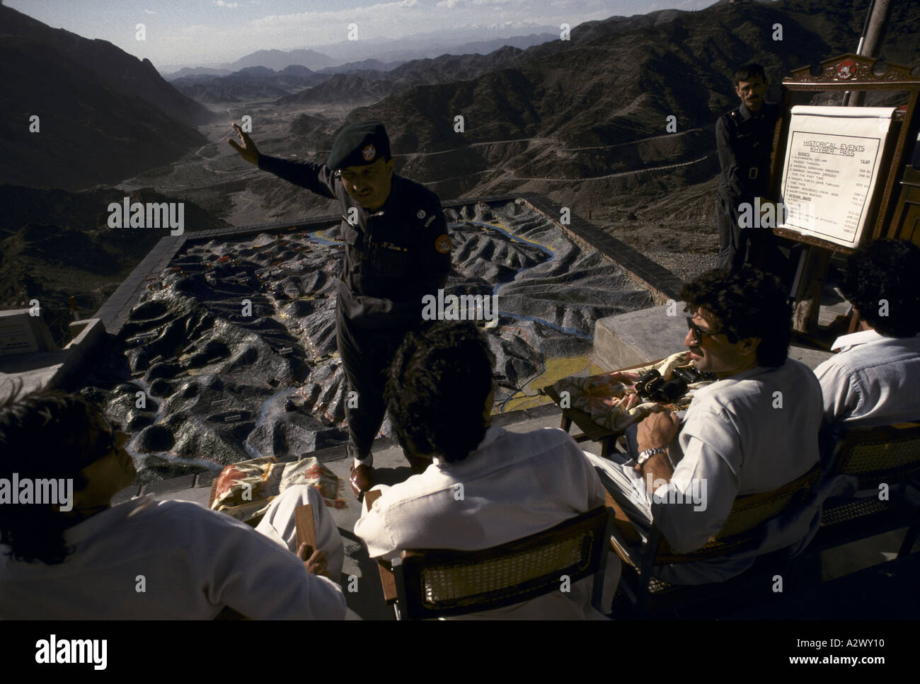 Khyber Pass, Pakistan, 1990; A Pakistani officer give a special briefing to cricketer Imran Khan  Pakistan (left) and his colleague Zikir Khan, 1990. Stock Photo