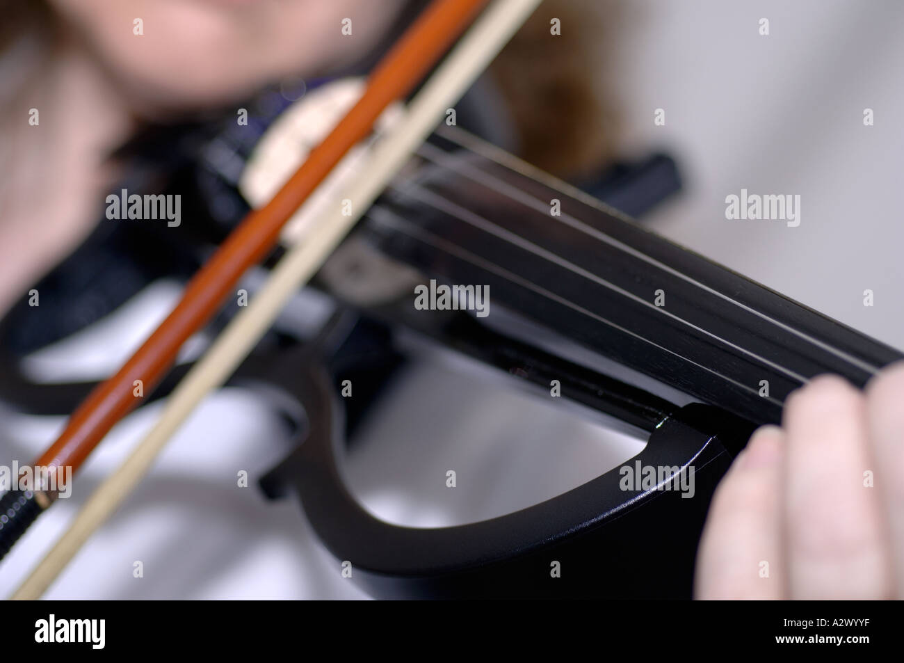 Woman playing electric violin Stock Photo Alamy